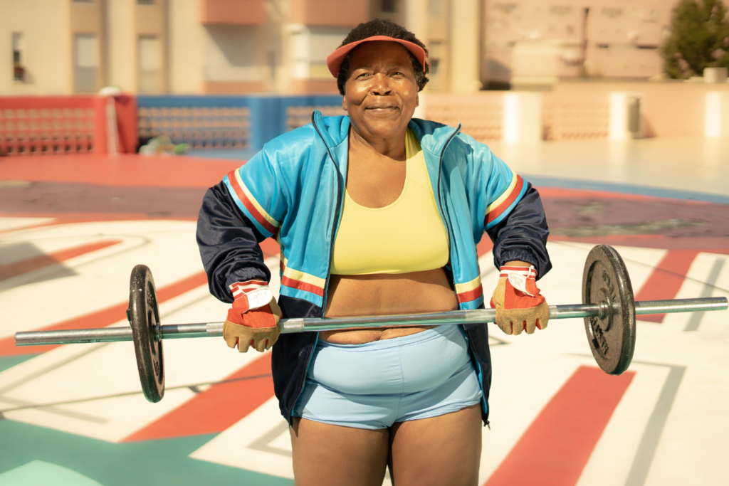 Older Woman Lifting Barbell.