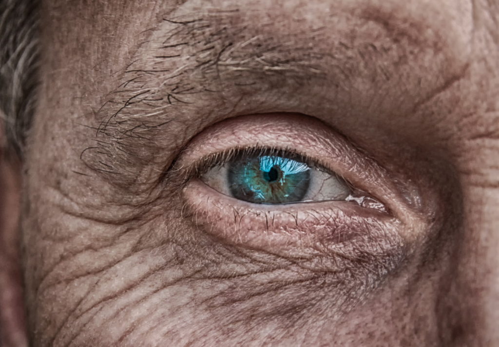 Zoom-in on Eye of Older Man.