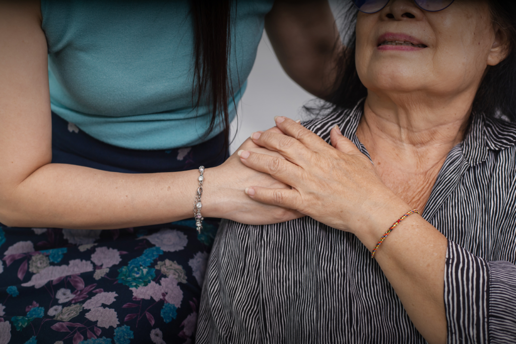 Older Woman being Reassured