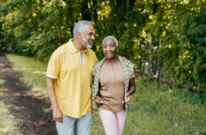 Couple of Color Walking Happily in the Forest